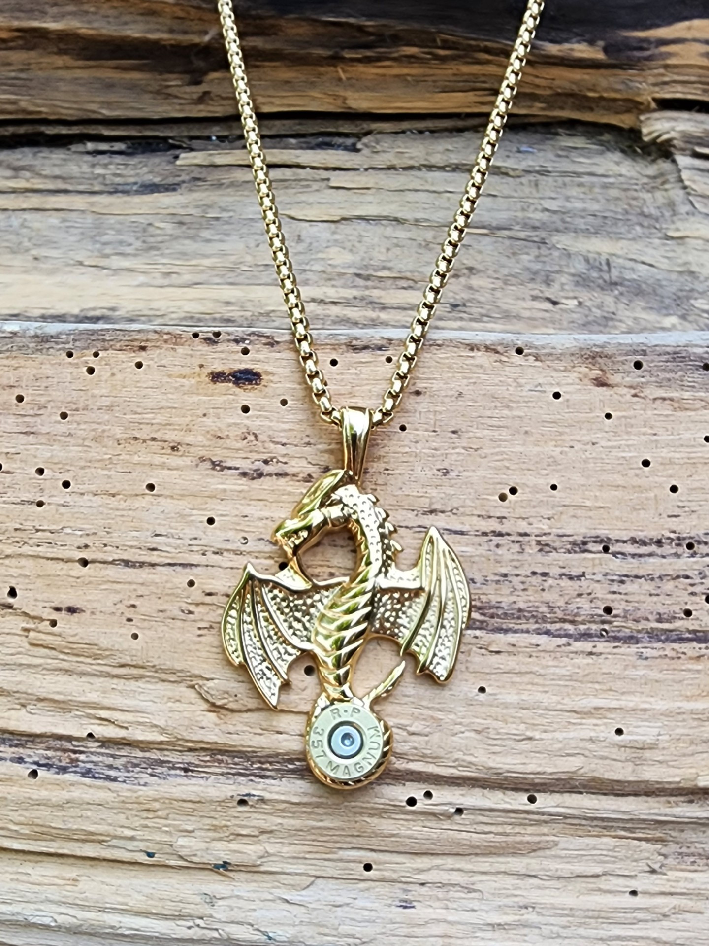 NGold Stainless Steel Dragon Necklace with a 357 Magnum Bullet on the