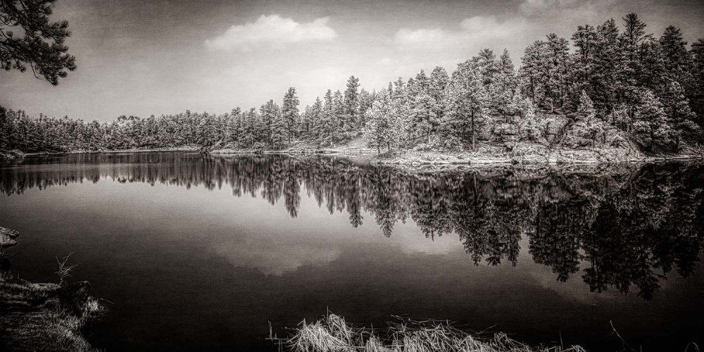 Exploring the Mystical Beauty of Center Lake: A Smokey Pond