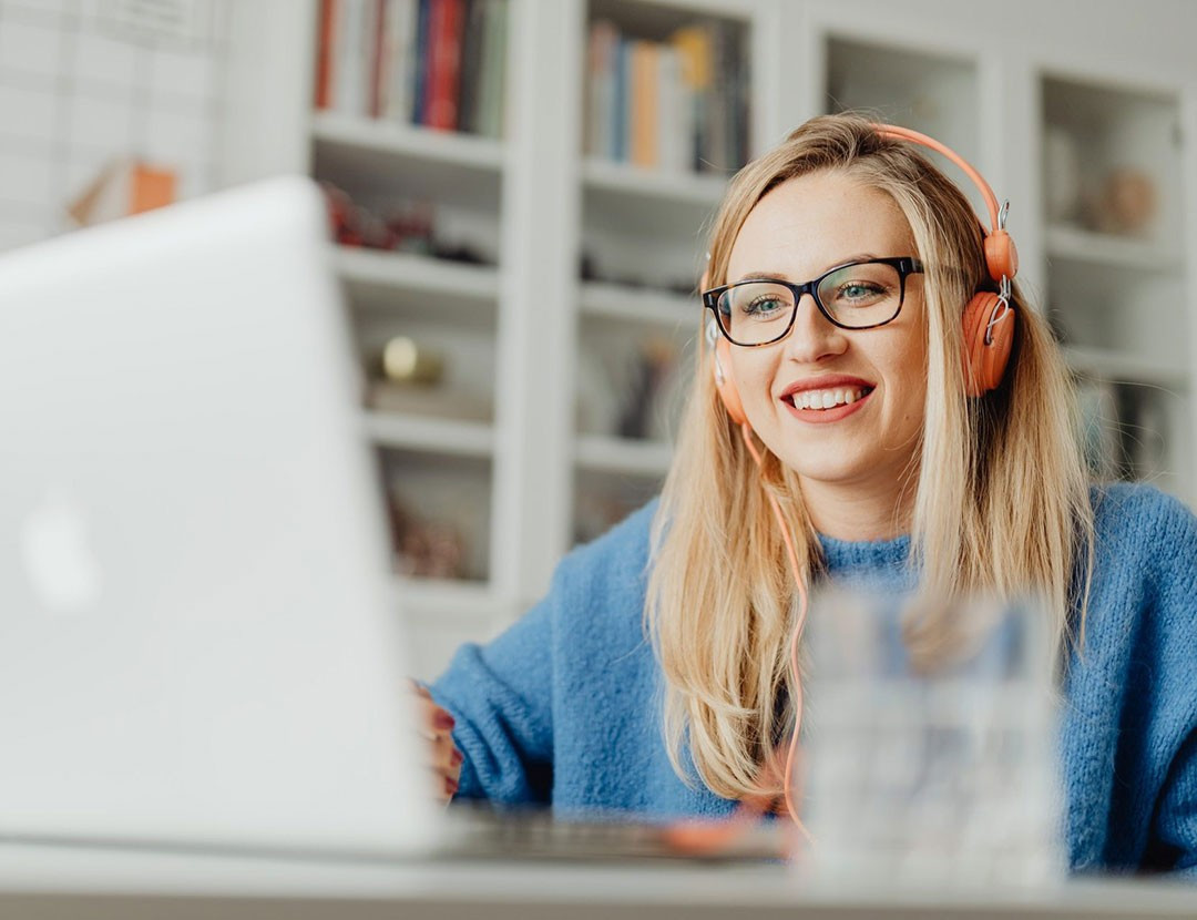 Online video making and editing benefits appreciated by a young lady.