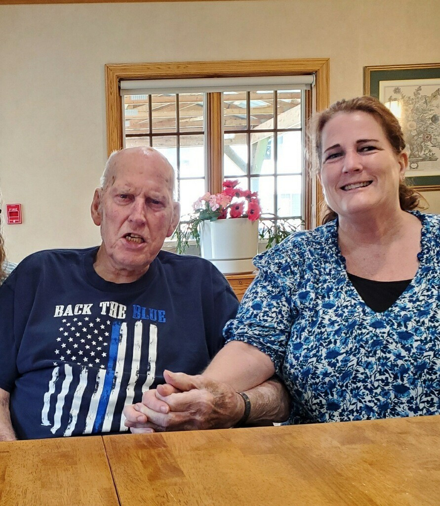 Ronda Peterson speaking at podium