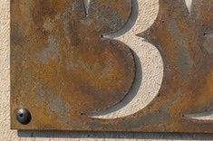 Rustic patina metal sign finish