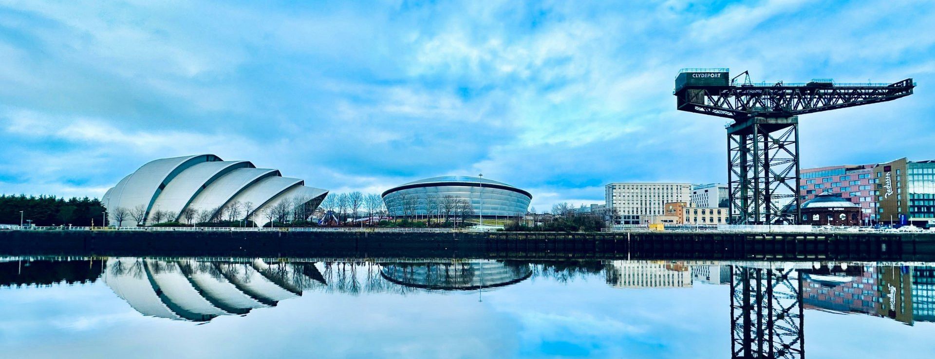 River Clyde waterfront with the Finnieston Crane, SEC Armadillo and OVO Hydro