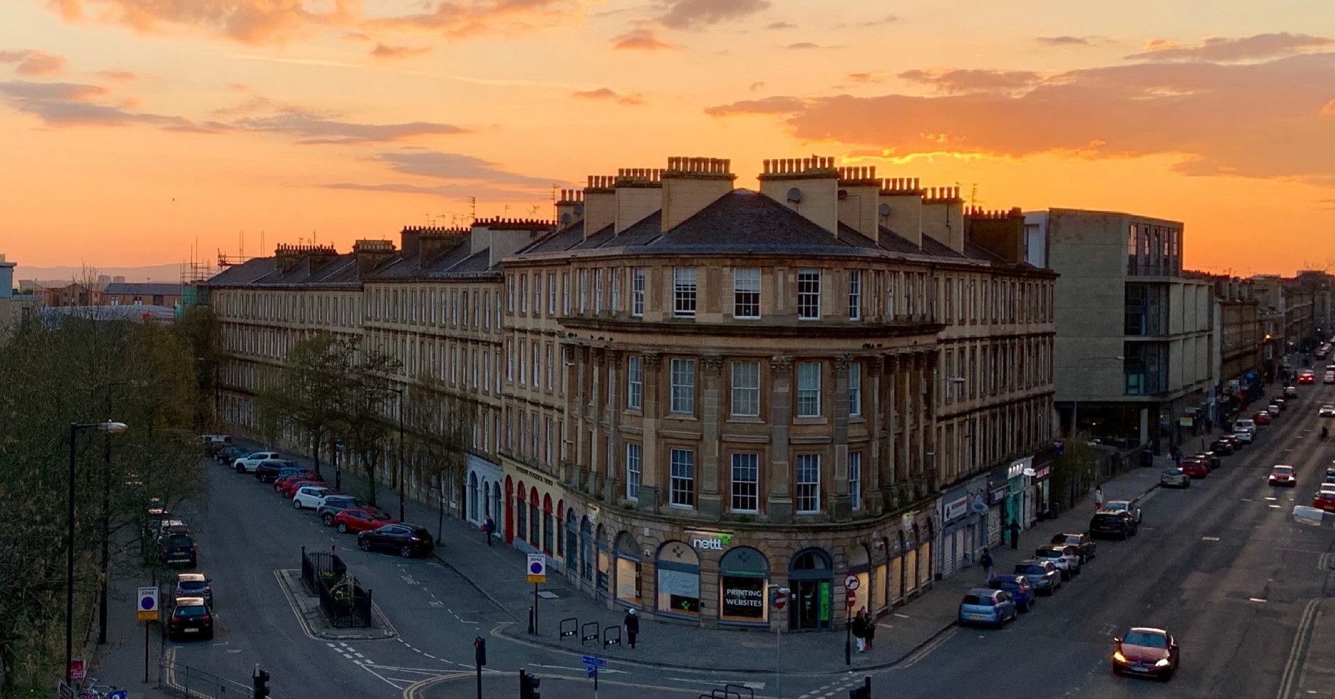 Sunset view of 7 Claremont Street's tenement facade, taken from the flat's living room window