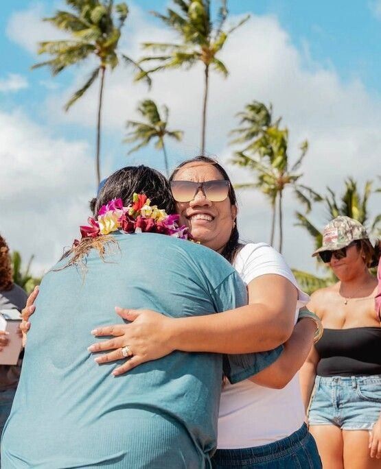 Friends hugging outdoors