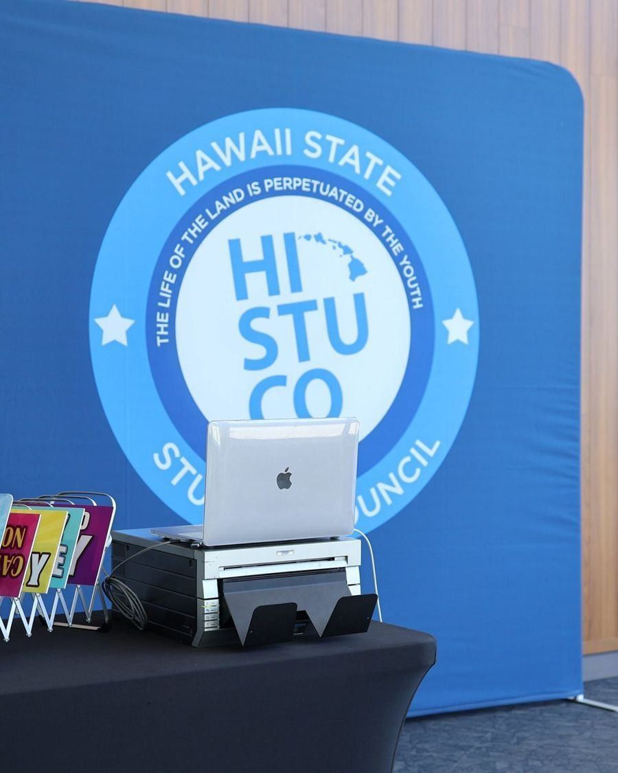 Photo booth with a custom printed backdrop