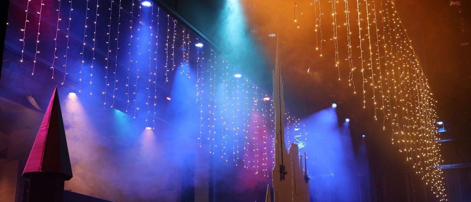 Stage lights over the castle set