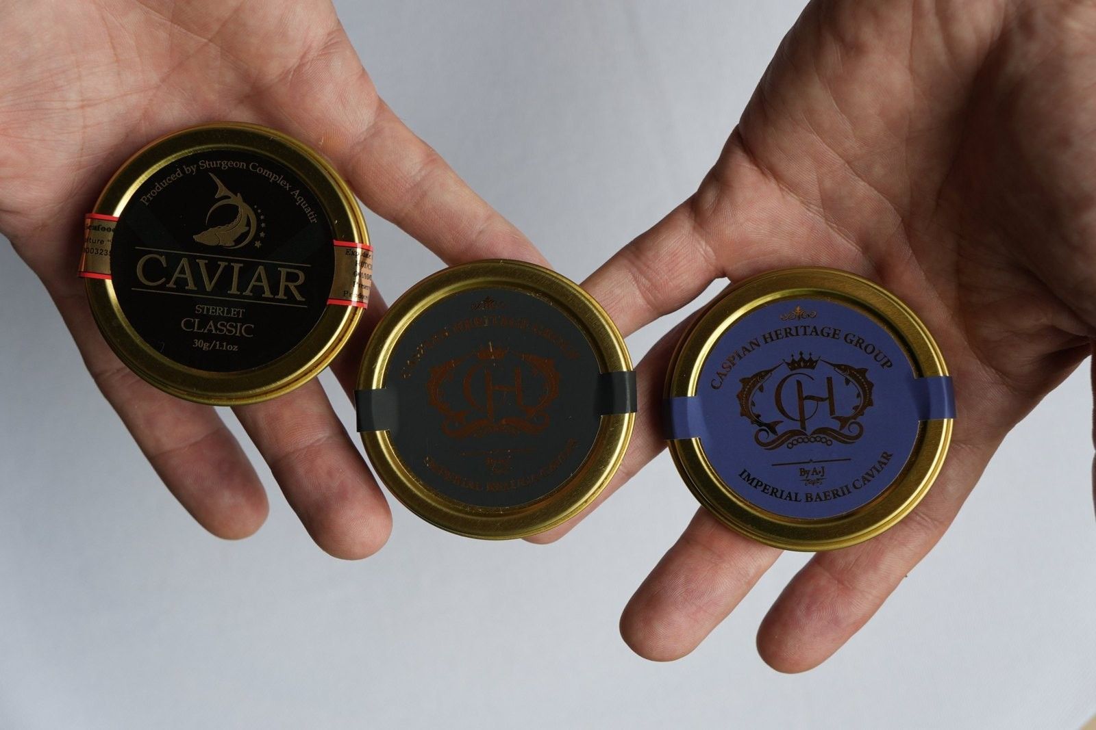 Three Caspian Heritage tins