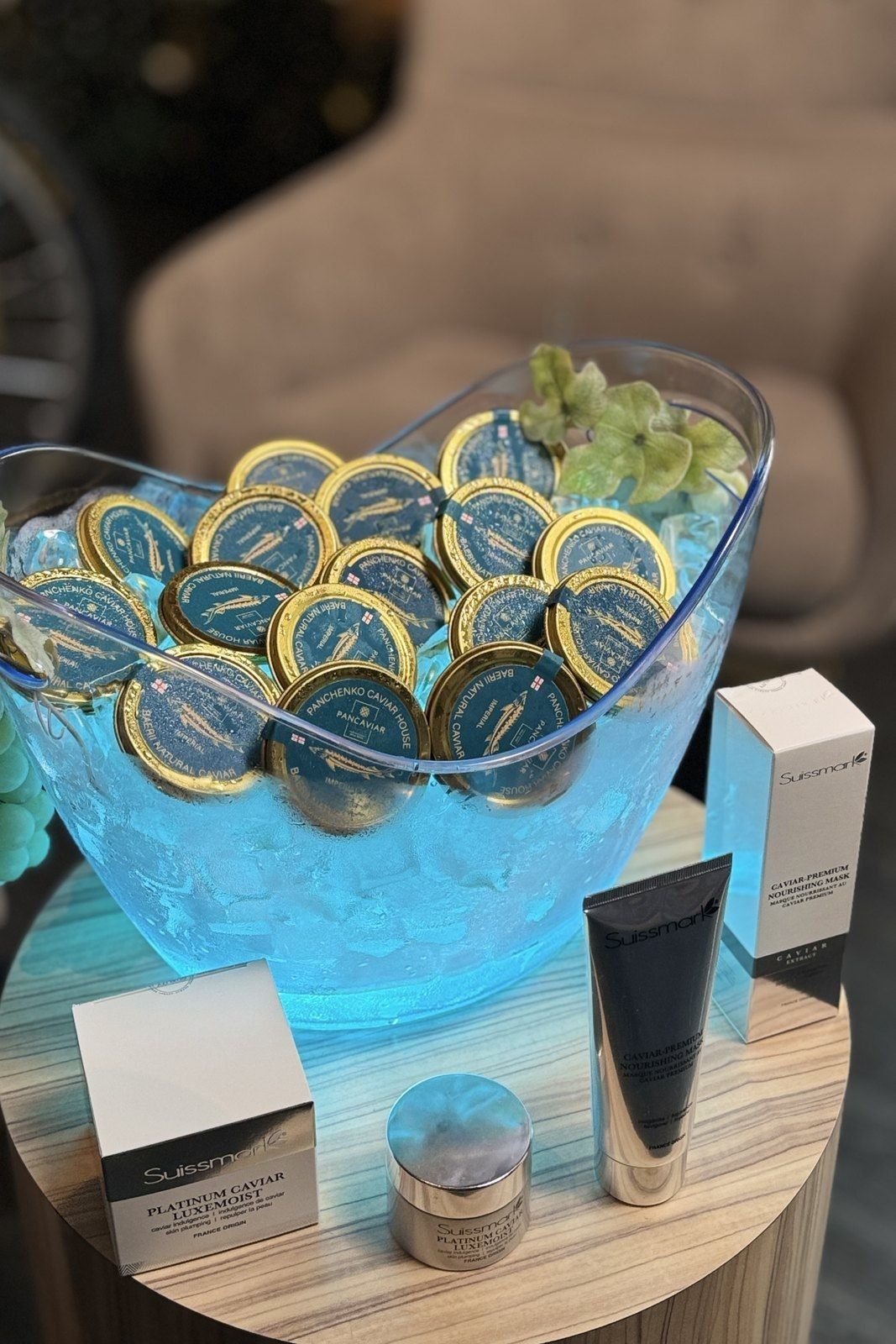 Caviar tins on ice at an event