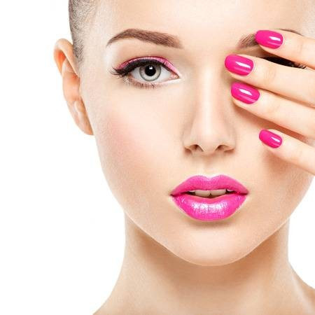 face with pink nails
