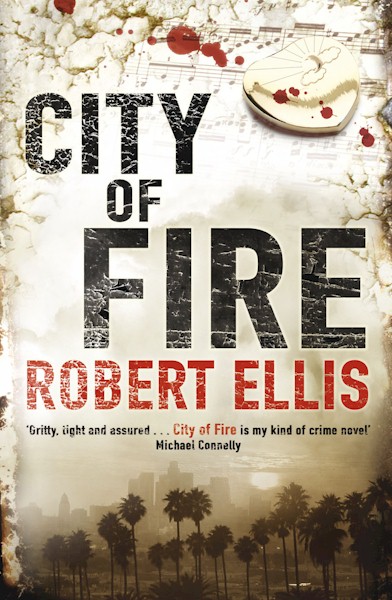 Cover of the UK edition of 'City of Fire' by Robert Ellis, featuring a dramatic image of Los Angeles buried in smoke with sheets of music, blood drops like tears, and the mysterious gold necklace, symbolizing the intense and gripping nature of the novel.