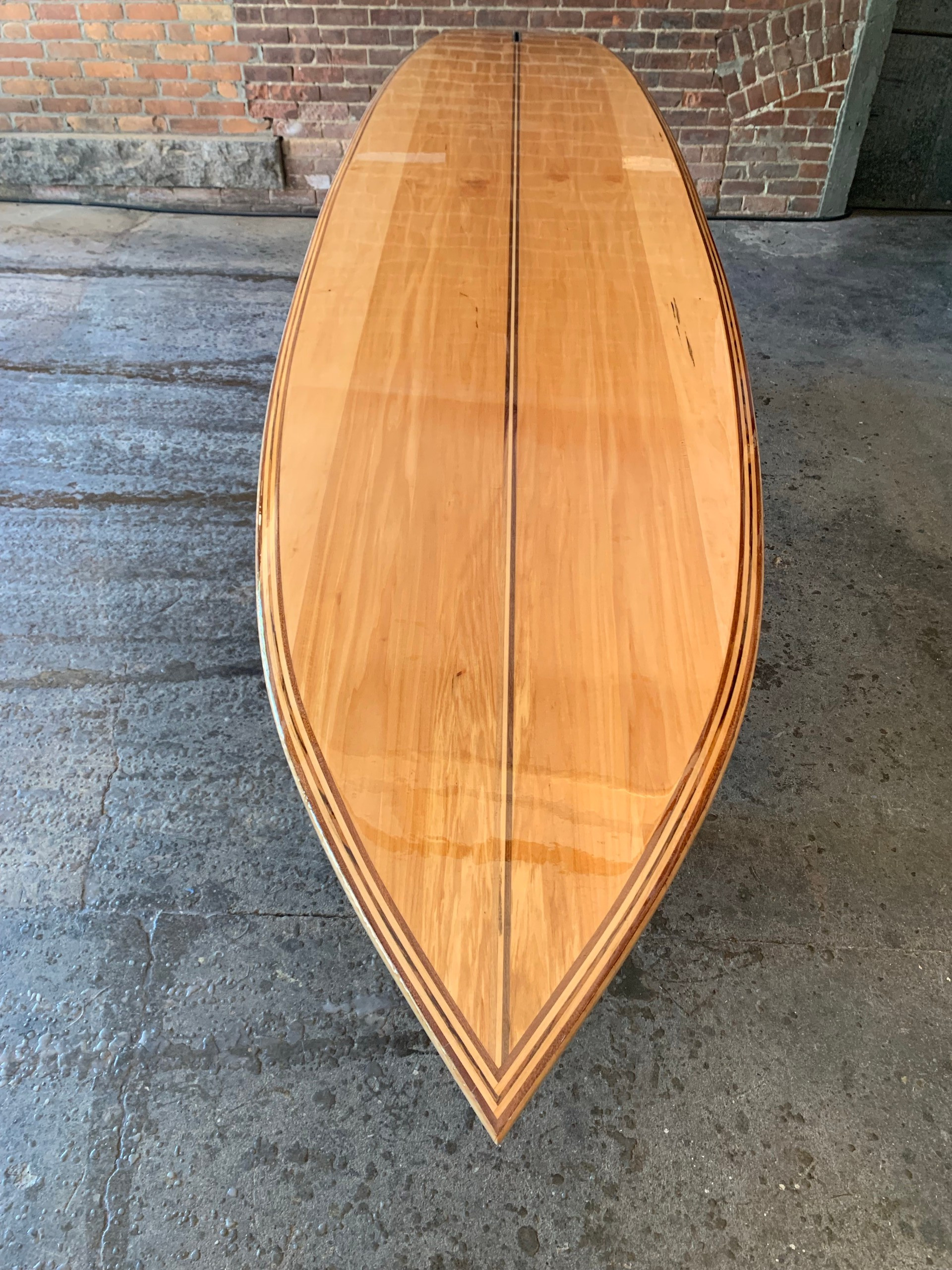 11.5' wood stand up paddle board bottom tip